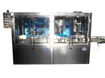 remplisseuse / capsuleuse rotative pour liquides max. 35 p/min P.M.R. System Group