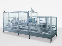 remplisseuse / scelleuse de solides pour emballage pr&eacute;form&eacute; (produits alimentaires) max. 40 p/min | DA J+P Maschinenbau
