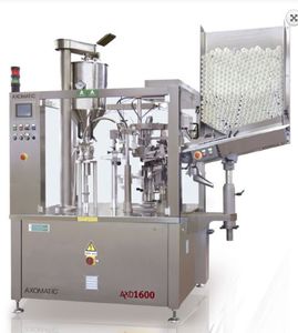 remplisseuse scelleuse automatique / rotative