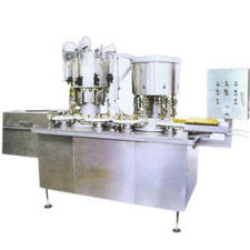 remplisseuse / scelleuse automatique / volumétrique / de liquides / pour produits chimiques