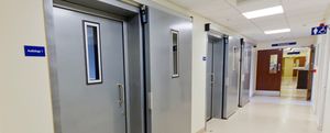 portes coulissantes / pour l'intérieur / en acier / coupe-feu