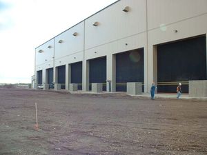 porte à enroulement / de hangar / industrielle / rapide