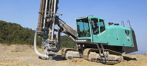 foreuse de trous de dynamitage / sur chenilles / fond de trou / pour chantier de construction