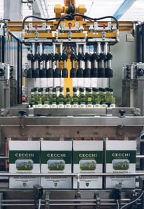 encaisseuse / décaisseuse à chargement par le haut / automatique / pour bouteilles / pour l'industrie alimentaire et de la boisson