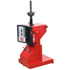 machine à équilibrer verticale / dynamique / pour roues / automatique