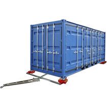 Patin rouleur pour container