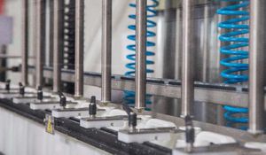 remplisseuse pour liquides / de bouteilles / automatique / à piston