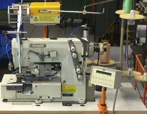 machine à coudre à base plane 1