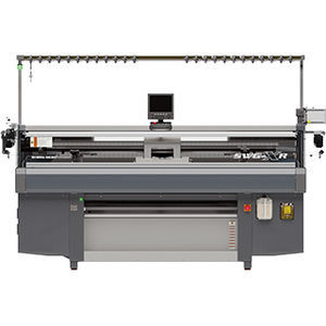 machine à tricoter plate 1