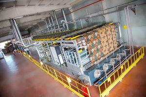 machine d'enduction ou de complexage d'adhésif