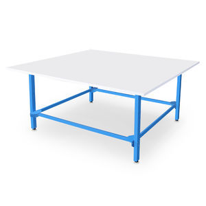table de découpe avec chariot matelasseur