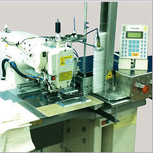 machine à coudre à une aiguille 1