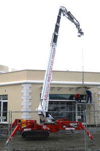 grue araignée sur chenilles