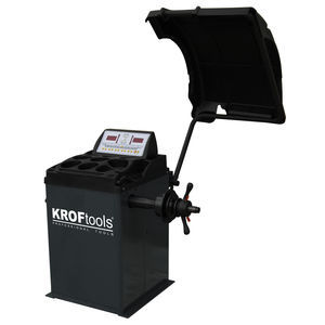 équilibreuse de roues semi-automatique