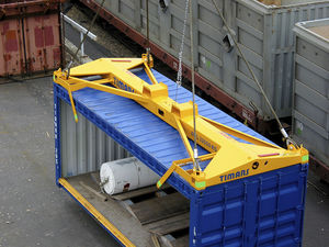 spreader pour container