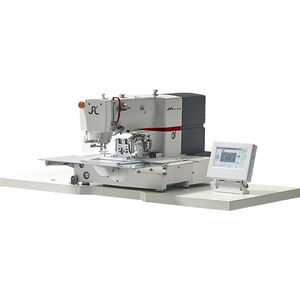 machine à coudre à une aiguille 1