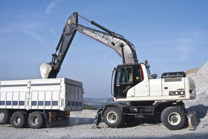 pelleteuse intermédiaire / sur pneus / Tier 4 final / pour chantier de construction