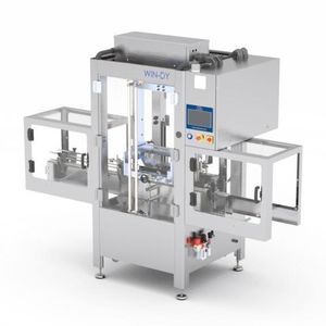 rinceuse / machine de soufflage pour conteneur
