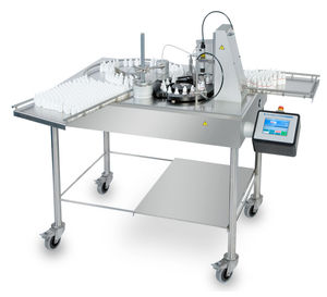 remplisseuse / boucheuse pour produits pharmaceutiques