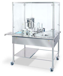 remplisseuse / boucheuse pour produits pharmaceutiques