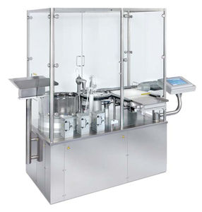 remplisseuse / boucheuse pour produits pharmaceutiques