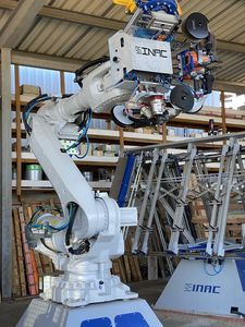 Ligne de palettisation et d'emballage robotisée