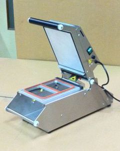 machine de pose de couvercle 1