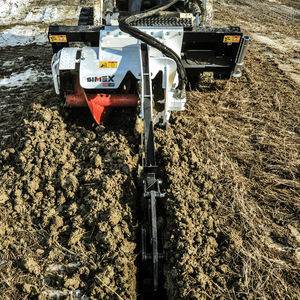 trancheuse de sol à chaînes / à chenilles / pour chargeuse compacte