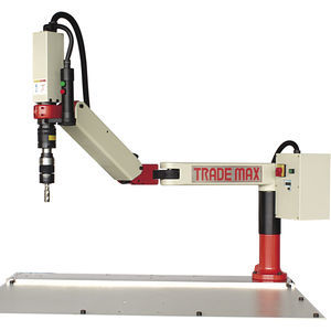 machine à tarauder à bras articulé