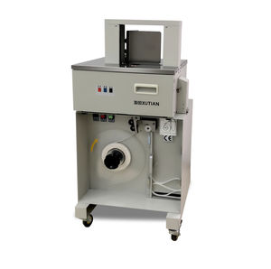 machine de pose de bandeau automatique