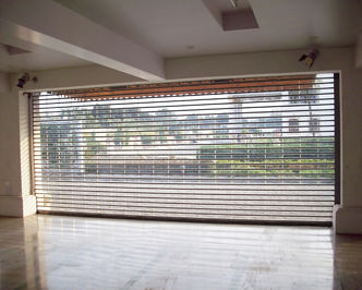 Porte à enroulement - Gandhi Automations Pvt Ltd - en polycarbonate / vitrée / industrielle