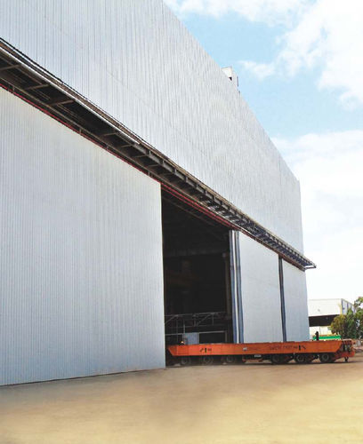 Porte coulissante - Gandhi Automations Pvt Ltd - en acier / de hangar / industrielle