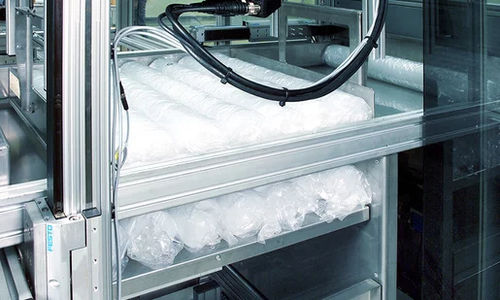 Sleeveuse automatique - Vertisleever - Kiefel GmbH - pour flexible / de gobelets