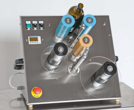Système d'étiquetage semi-automatique - Rizzolio s.r.l - pour bouteilles / pour applications sur le côté / pour l'industrie agroalimentaire