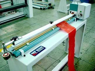 Scelleuse automatique - SEAL-TA - RIUS-COMATEX - de film / avec alimentateur / de découpe