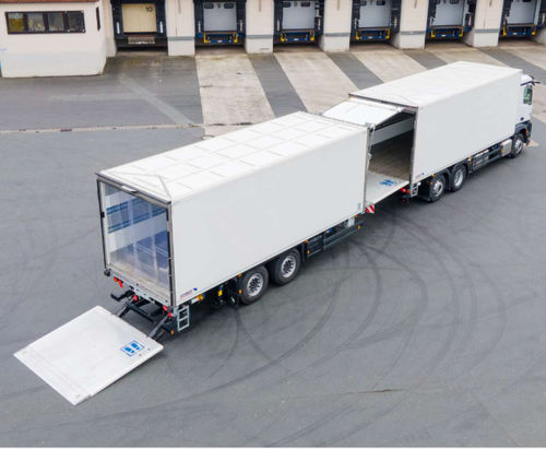 Semi-remorque porte-conteneur - M.KO - Schmitz Cargobull - porte-engin / de produits longs / à 4 essieux