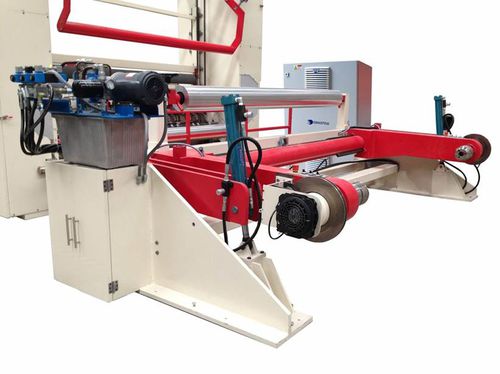 Machine de déroulage sans arbre - Dimatra - de tissus