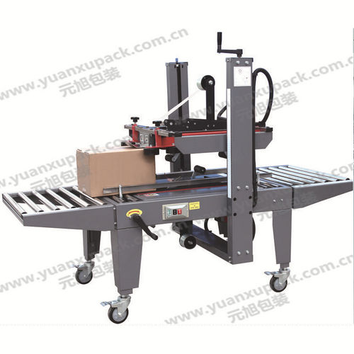 Fermeuse de caisses en carton à double rabats - YK-07B - Yuanxu Packing(shanghai) Machinery Co., LTD - ruban adhésif / semi-automatique