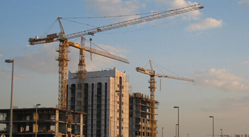 Grue à tour - TC7032-F-52.4 - Hangzhou Truemax Machinery & Equipment Cp.,Ltd - fixe / pour chantier