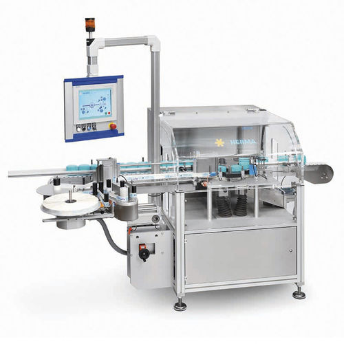Étiqueteuse pour bouteilles - 040M  - HERMA FRANCE - wrap-around / pour l'industrie pharmaceutique / à haute vitesse