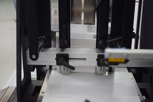 Système d'alimentation automatique - E-Packaging Srl - à tapis / pour machines d'emballage / de paquets