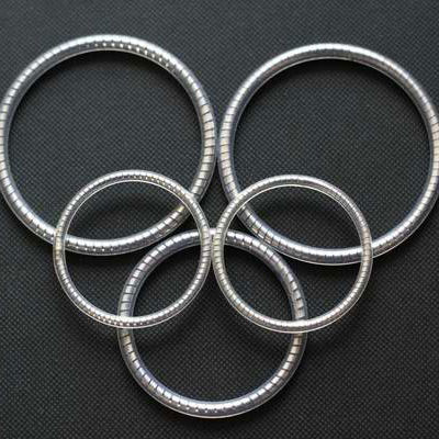 Joint à ressort - Ningbo Chenming Seals Manufacturing Co., Ltd. - en inox / en PTFE / circulaire