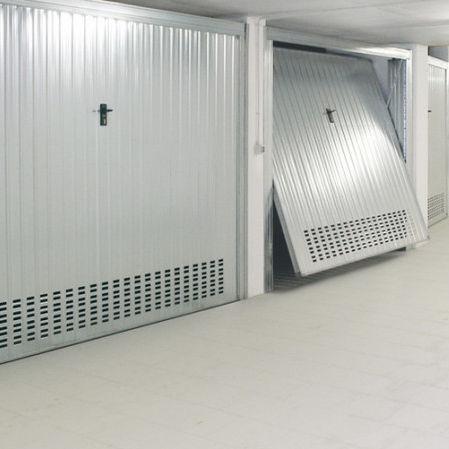 Porte basculante - ZINK - Ballan Spa - en acier galvanisé / industrielle / pour garage