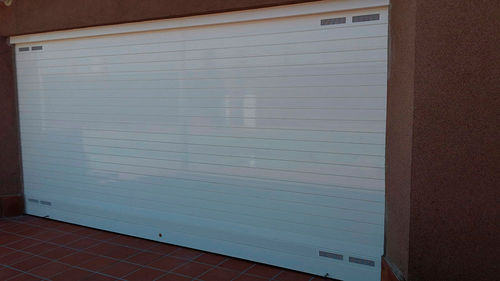 Porte à enroulement - Talleres Alfa Torres - en aluminium / industrielle / de sécurité