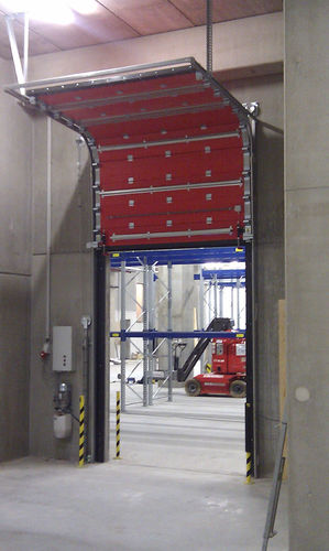 Porte sectionnelle - Talleres Alfa Torres - pour l'intérieur / ignifugée / antidéflagrante