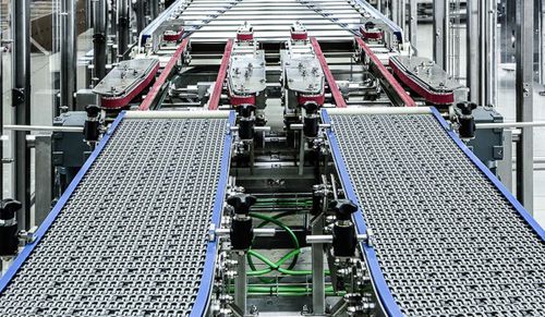 Convoyeur à bande - Carpentier Packaging GmbH - à rouleaux / à chaînes / de distribution