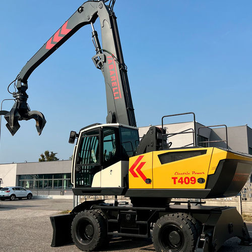 Pelle de manutention sur pneus - T409-2CE - OFFICINA MECCANICA F.LLI TABARELLI SPA - électrique / de gasoil