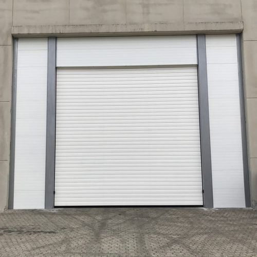 Porte coulissante verticale - Armo s.p.a. - en métal / industrielle / pour commerce