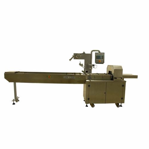 Machine d'emballage contrôlée par PLC - UM 1200 - Uygurlar Makina - horizontale / pour boulangerie industrielle / avec convoyeur