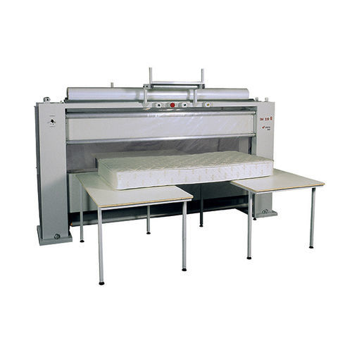 Machine d'emballage semi-automatique - SM220 R - DUEFFE - sous film / horizontale / pour matelas